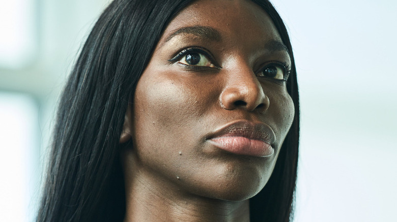 Michaela Coel with long hair