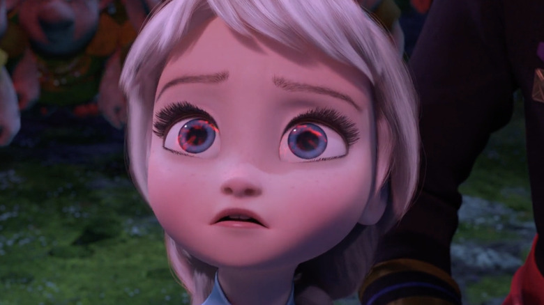 Young Elsa looking up at sky