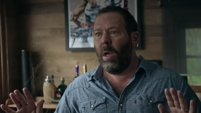 Bert Kreischer holds up hands