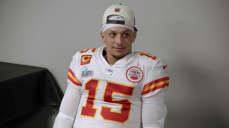 Patrick Mahomes in fottball uniform smiling