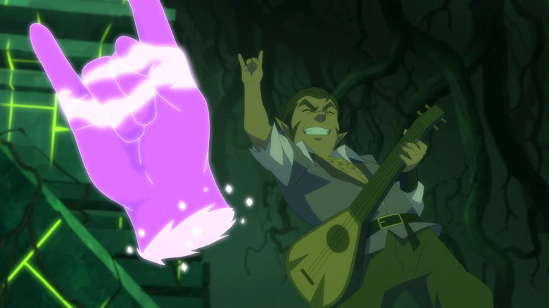 A purple hand floats behind Scanlan