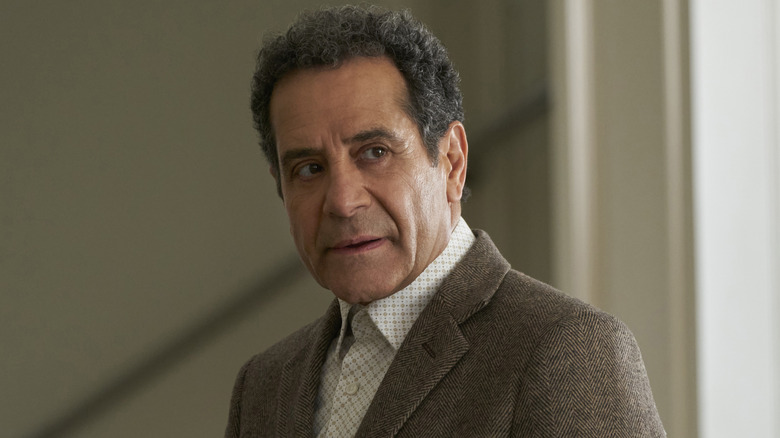 Tony Shalhoub staring