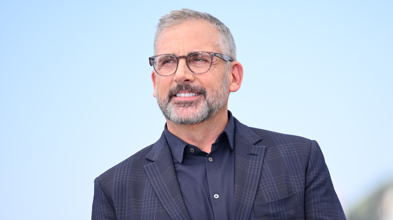 Steve Carell smiling glasses blue jacket