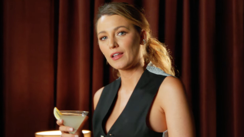 Blake Lively holding drink